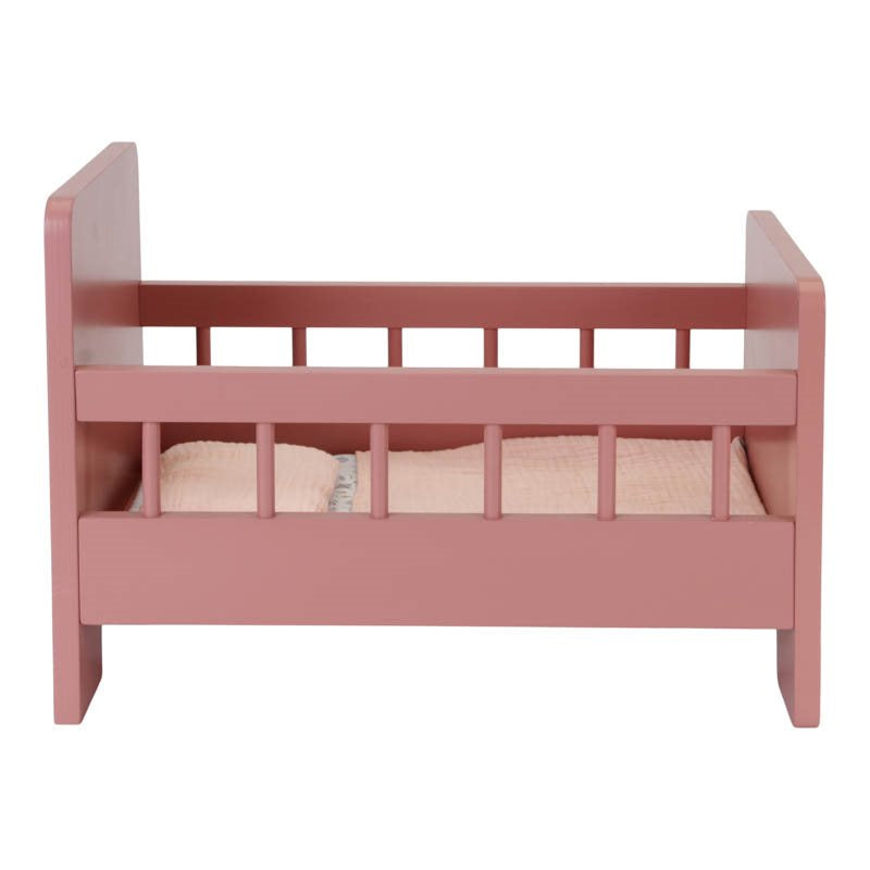 Pink doll's bed