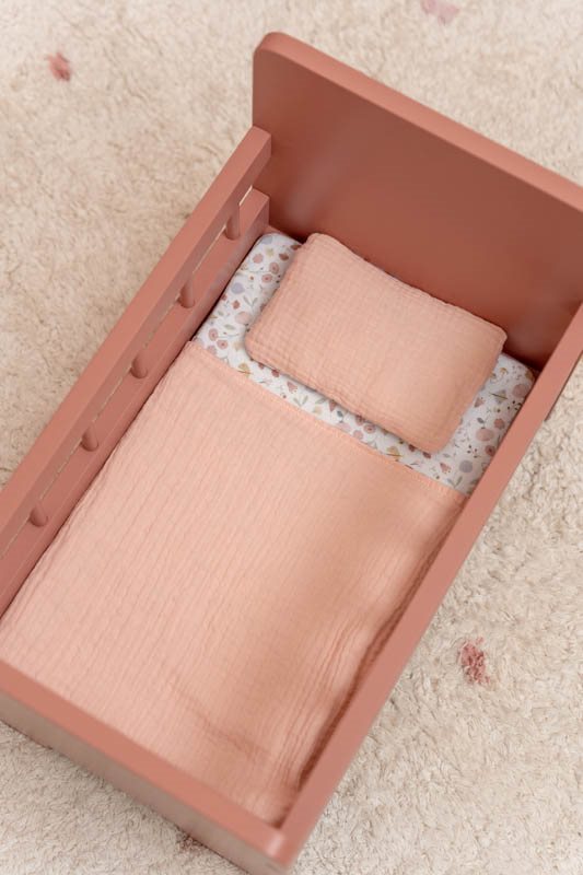 Pink doll's bed